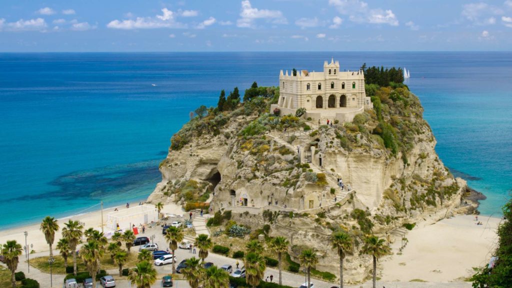 Santa Maria dell'Isola, a stunning church perched on a rocky cliff in Tropea, Italy, overlooking the Tyrrhenian Sea.