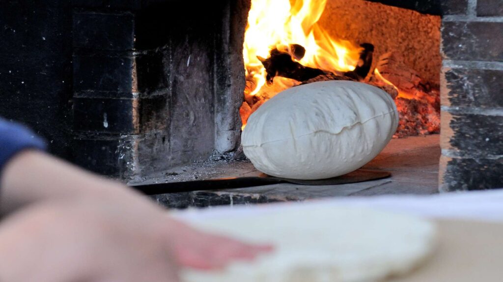 Pane Carasau – Traditional Sardinian flatbread, also known as Carta da Musica, showcasing its thin and crispy texture.