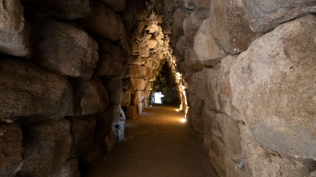 Santu Antine Nuragic Stone Age Nuraghe in Sardinia, Italy – A close-up image showcasing the ancient stone structure, a testament to Sardinia's rich archaeological history.