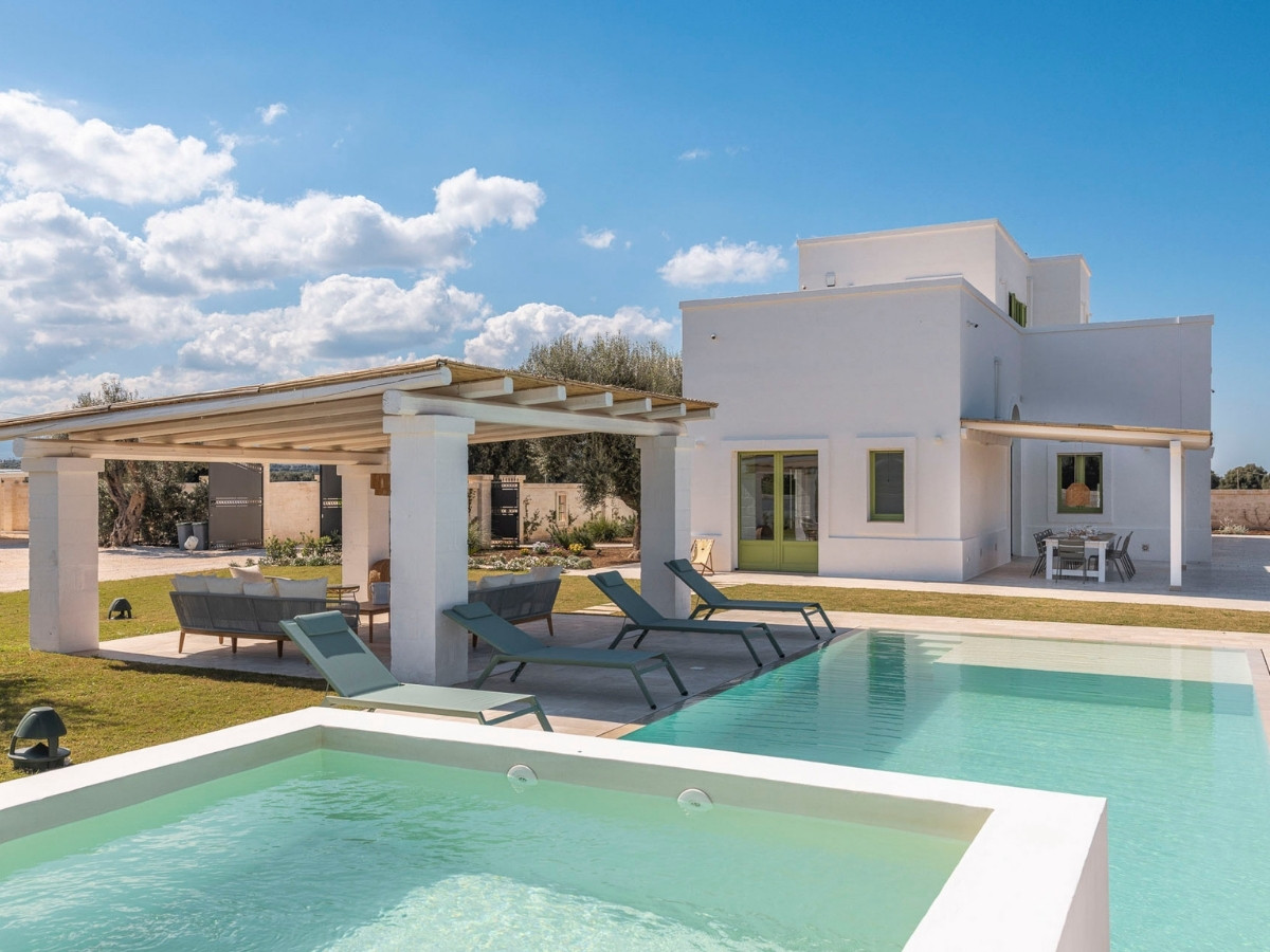 Luxury white villa in Puglia with a private pool and olive groves