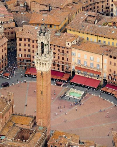 Panoramic view of Siena, Tuscany, Italy, showcasing the historic cityscape, medieval architecture, and the iconic Piazza del Campo.
