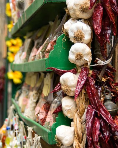 Colorful spice store in Siena, Italy, showcasing a vibrant array of spices, herbs, and traditional Italian flavors.