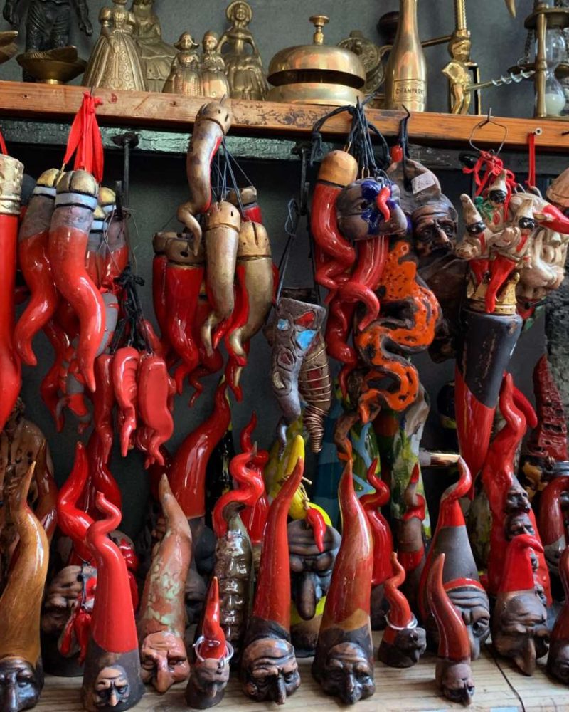 Talisman, good luck charm on display in San Gregorio Armeno, Naples, showcasing traditional handmade creations believed to bring good fortune.